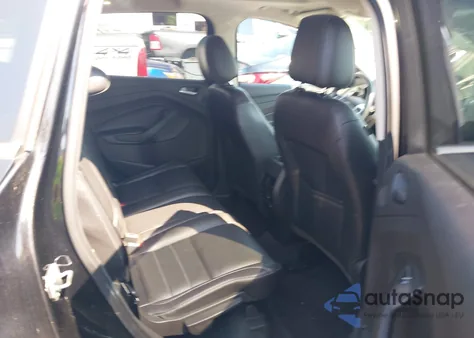 2016 Ford Escape Titanium z USA, uszkodzony, nr VIN 1FMCU9J91GUB64620